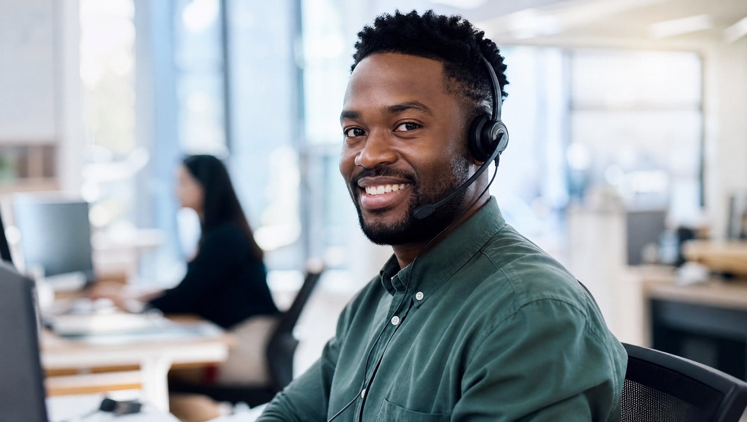Sales professional using an AI voice agent on a headset call